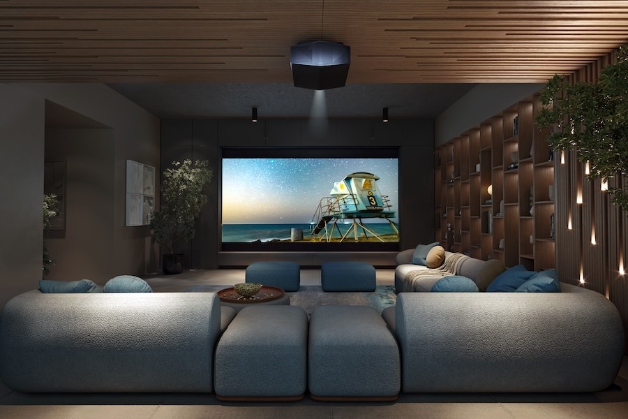 A luxury home theater with modular seating and a projector overhead.